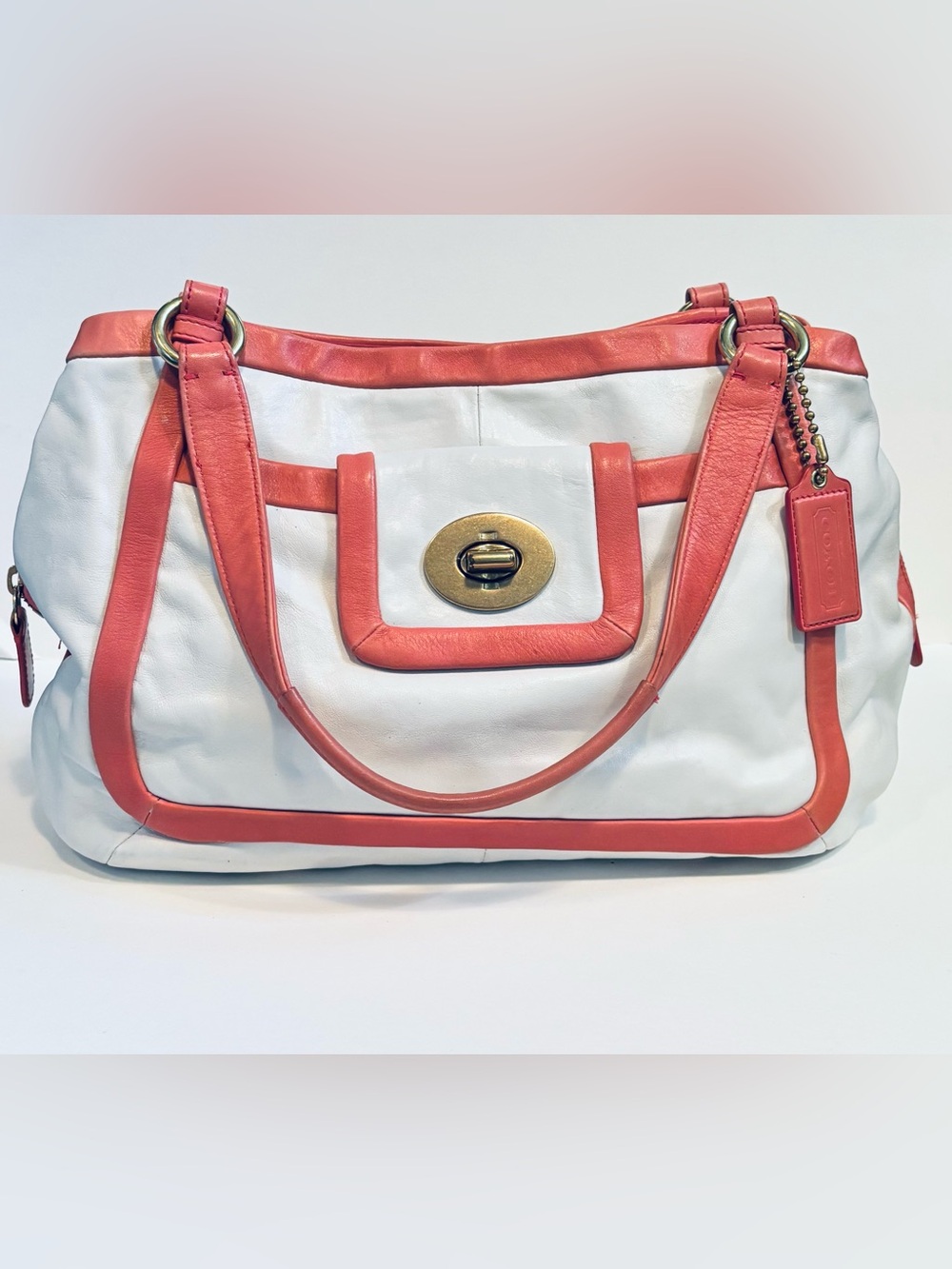 Coach Cricket White and Coral Pink Leather Tote Bag with Turn-Lock Closure
